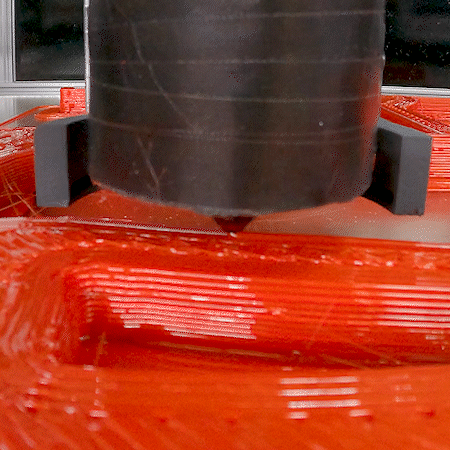 Close up of pellet extruder printing.
