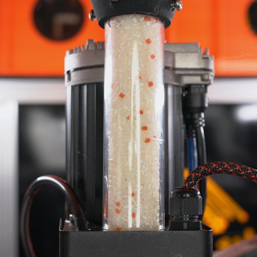 Animation of pellets flowing in a tube for a pellet extruder for large format 3d printing