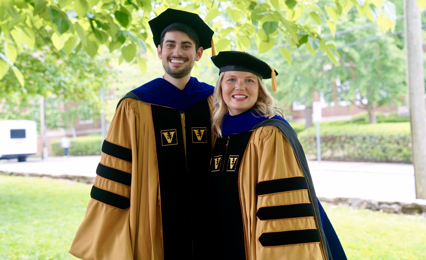 Dr. D-Flo and Andi Graduating from their PhD Programs 